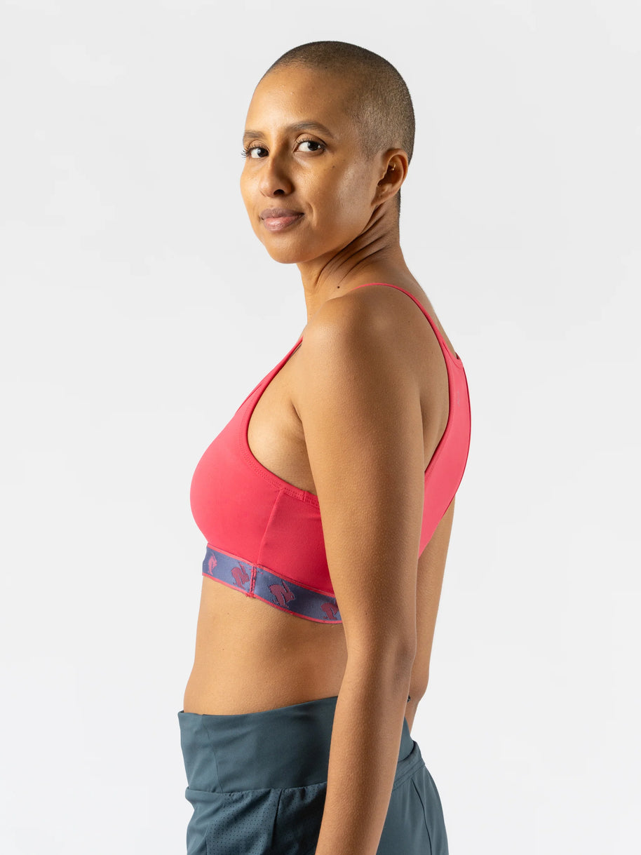 Strappy Pocket Bra - Women by Rabbit in coral red with built-in pocket, minimal bounce, and comfortable fit for active use and running