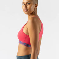 Strappy Pocket Bra - Women by Rabbit in coral red with built-in pocket, minimal bounce, and comfortable fit for active use and running