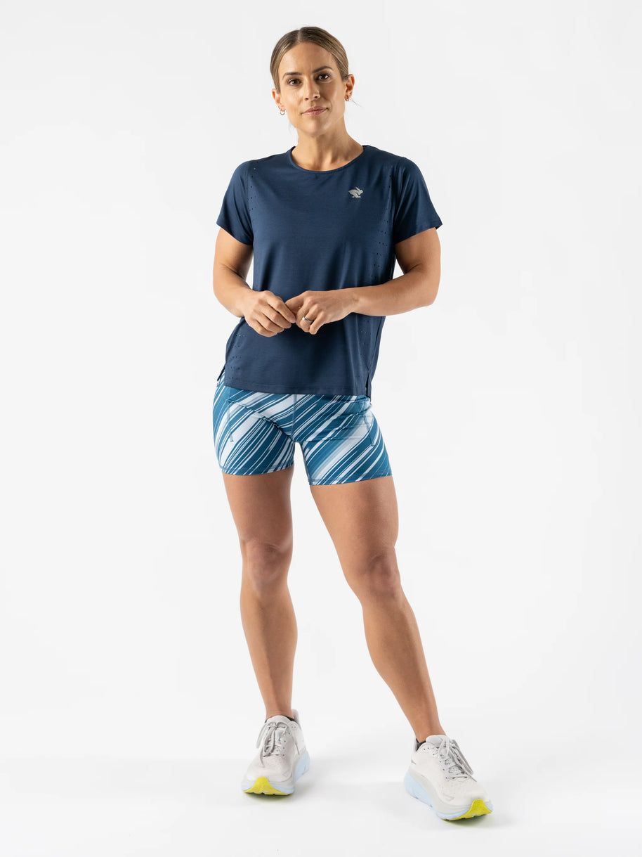 Race Pace Tee SS - Women by Rabbit in navy blue with breathable laser-cut perforations, semi-relaxed fit for running and training use