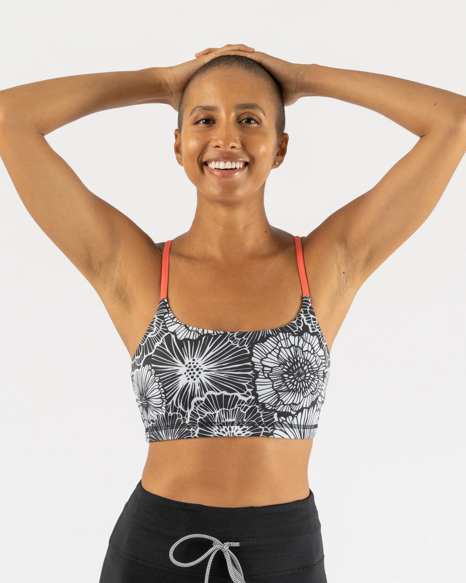 EZ Bra-Vo by Rabbit in black and white floral print with coral straps, light support bra ideal for active and rest days comfort