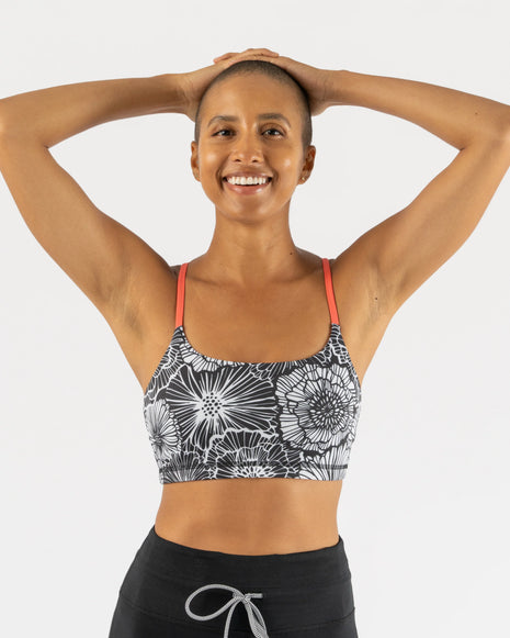 EZ Bra-Vo by Rabbit in black and white floral print with coral straps, light support bra ideal for active and rest days comfort