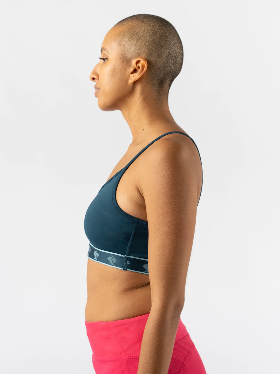 Strappy Pocket Bra - Women by Rabbit in dark blue with built-in pocket, minimal bounce, sleek support for running and active wear
