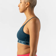 Strappy Pocket Bra - Women by Rabbit in dark blue with built-in pocket, minimal bounce, sleek support for running and active wear