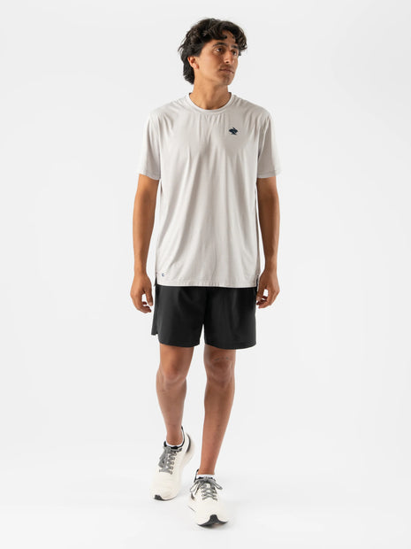 UPF Tee SS - Men by Rabbit in light grey, ultra lightweight jersey with UPF 50 and laser-cut venting for sun protection and running.