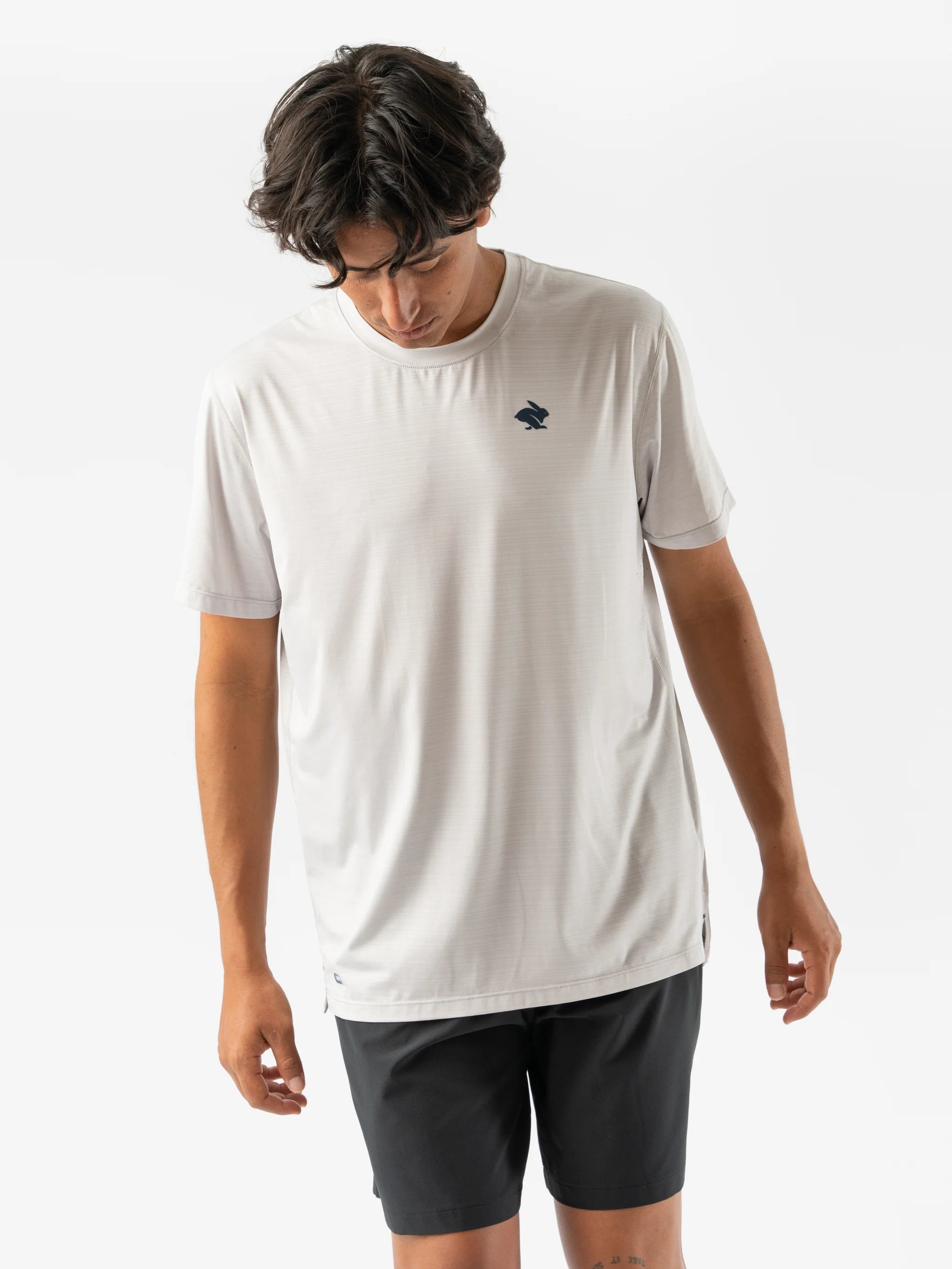UPF Tee SS - Men by Rabbit in light grey with UPF 50 protection, lightweight breathable tee with laser-cut ventilation, ideal for running and outdoor use
