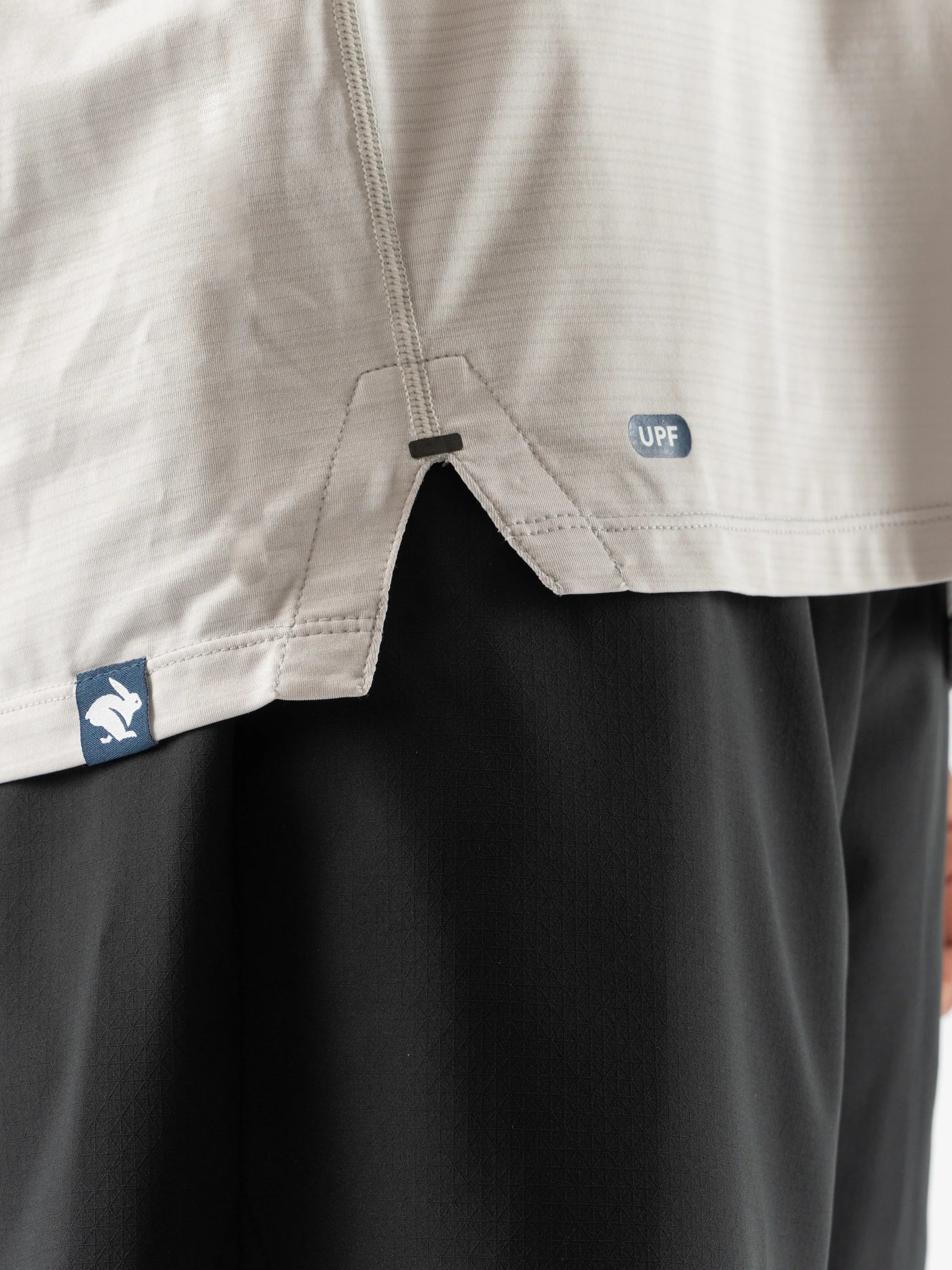 UPF Tee SS - Men by Rabbit in light beige with laser-cut perfs, lightweight breathable jersey, UPF 50 protection for outdoor running and sun safety