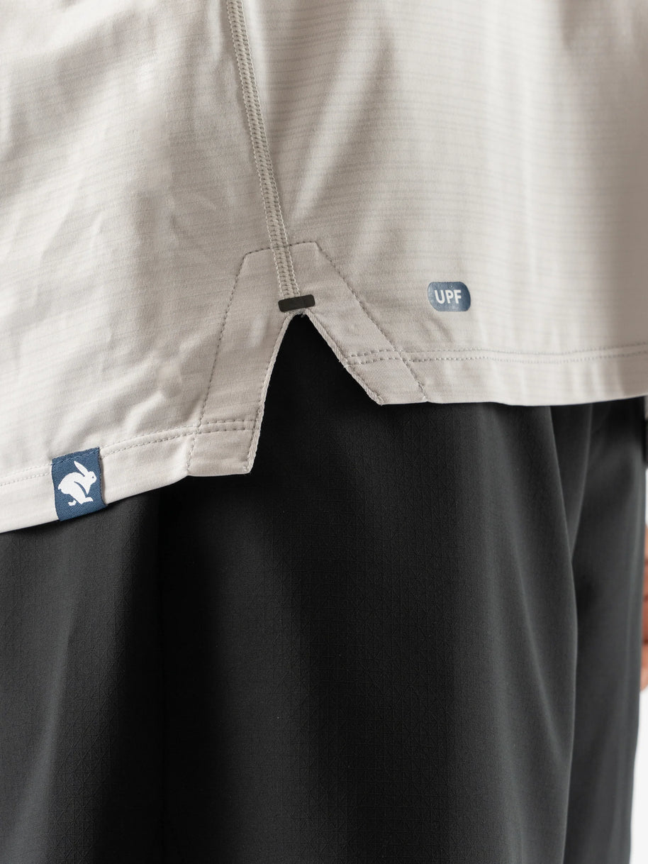 UPF Tee SS - Men by Rabbit in light beige with laser-cut perfs, lightweight breathable jersey, UPF 50 protection for outdoor running and sun safety