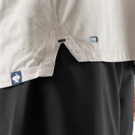 UPF Tee SS - Men by Rabbit in light beige with laser-cut perfs, lightweight breathable jersey, UPF 50 protection for outdoor running and sun safety