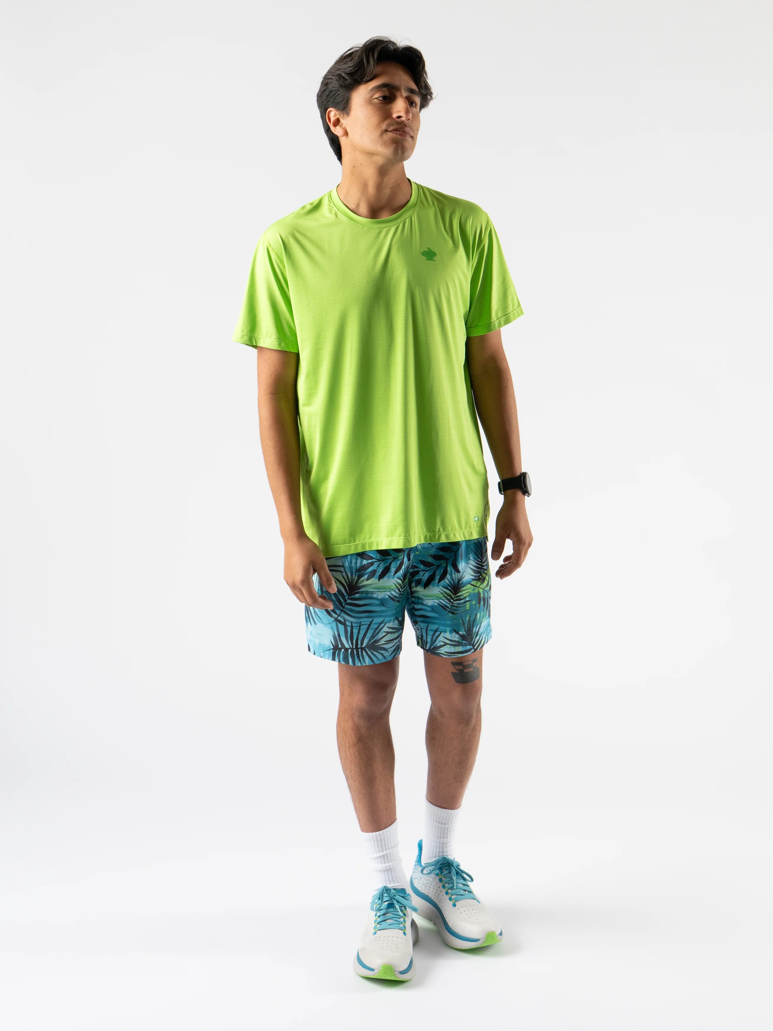 UPF Tee SS - Men by Rabbit in bright green lightweight jersey with UPF 50 and laser-cut perfs for breathability, ideal for outdoor running