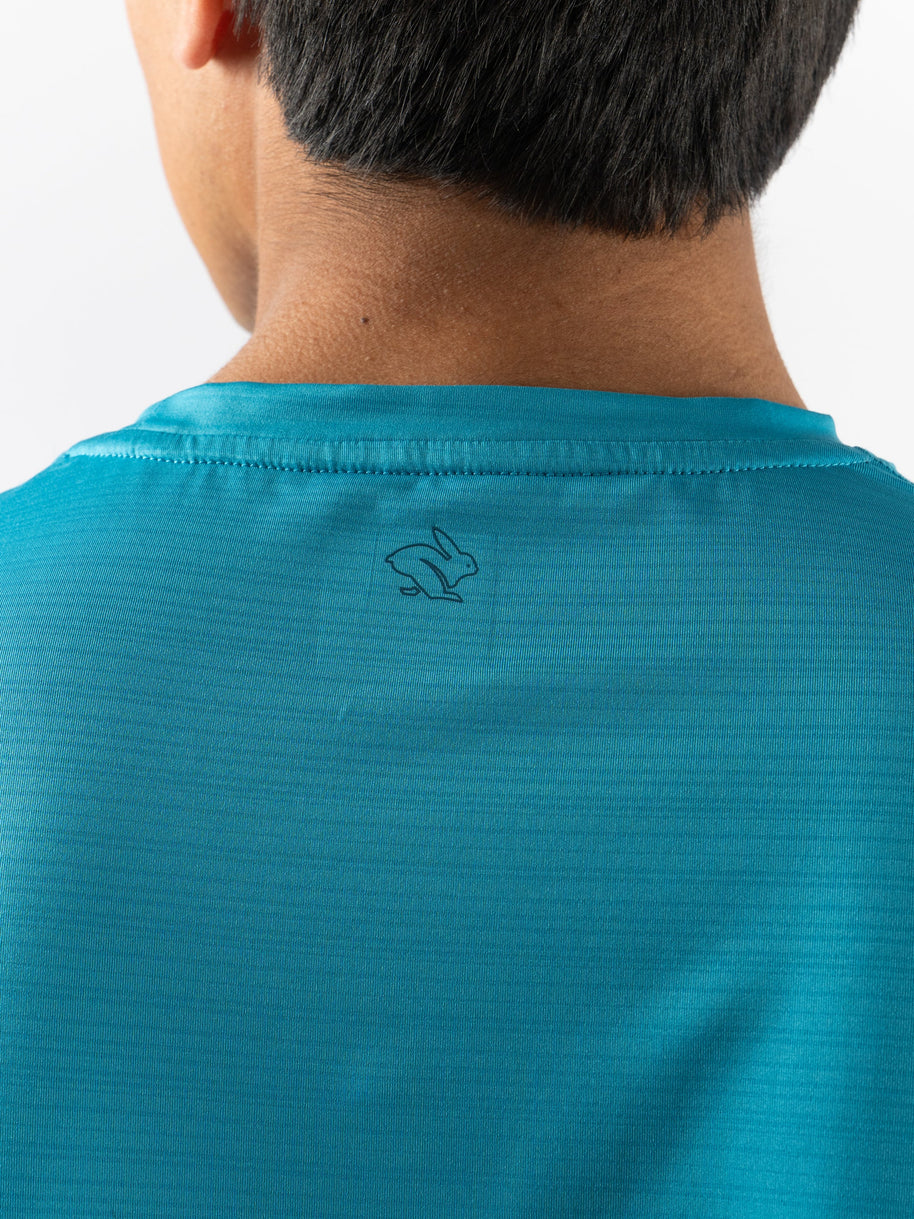 UPF Tee SS - Men by Rabbit in blue, lightweight breathable shirt with UPF 50 protection and laser-cut perfs for sun safety and running
