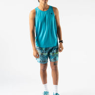 Man wearing Rabbit Ice Perf Tank - Men in blue with breathable perfs, sustainable quick-dry fabric made from recycled coffee grounds, ideal for running.