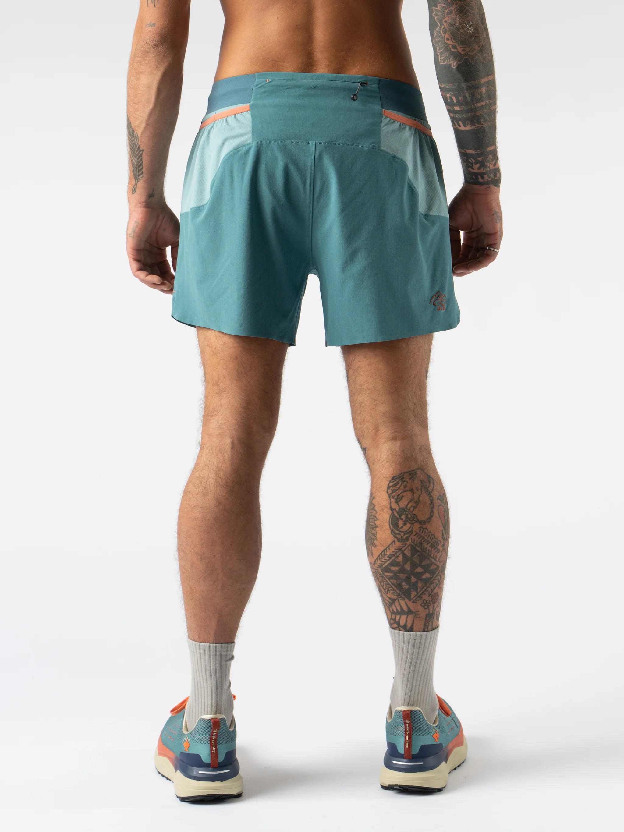 FKT 5 - Men by Rabbit in teal and light blue, lightweight stretch trail shorts with breathable comfort for running and outdoor use
