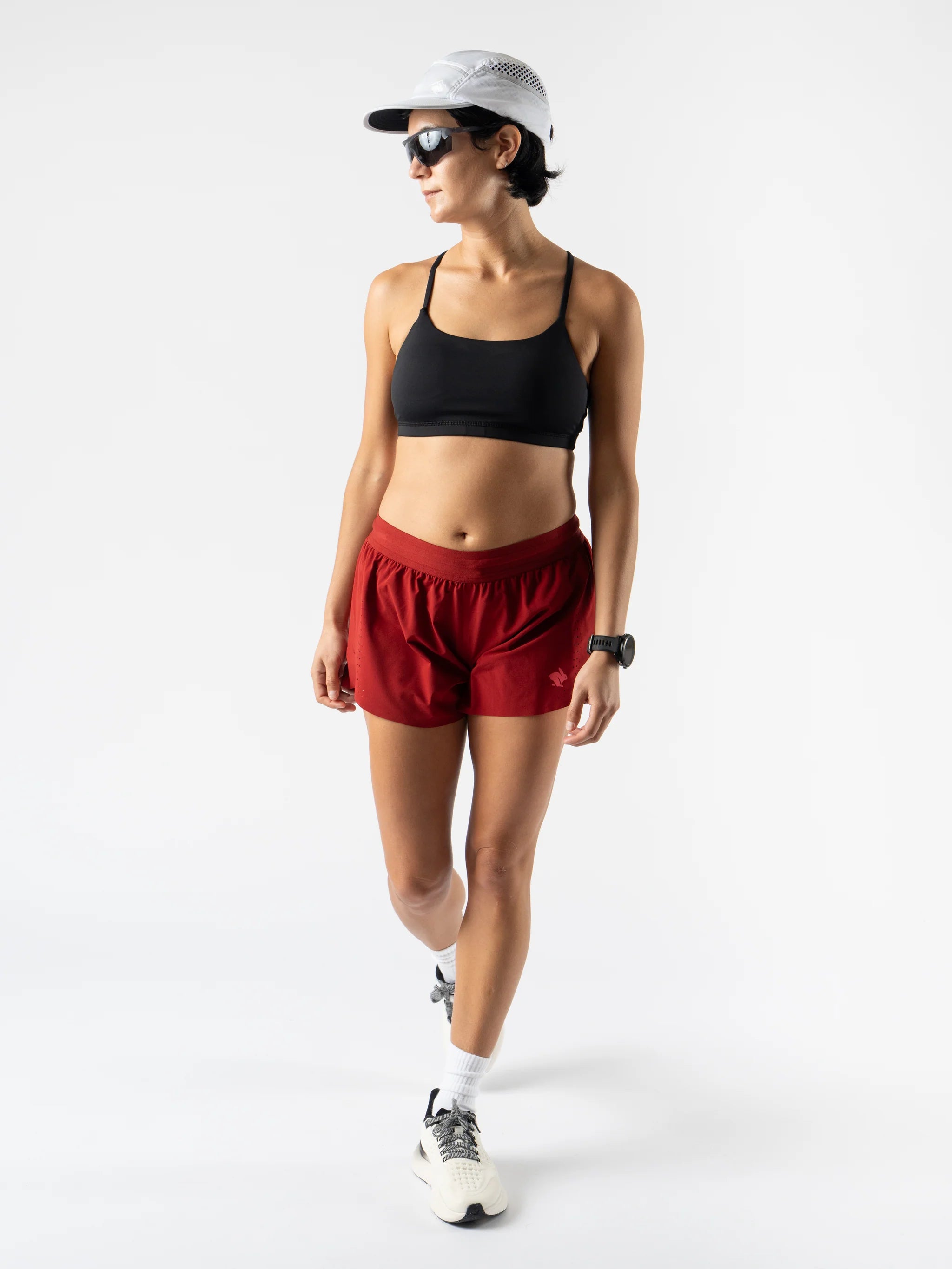 Fuel 'N Fly 4 - Women by Rabbit in red shorts with five pockets, lightweight and versatile for long-distance running and outdoor use