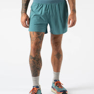 FKT 5 - Men by Rabbit in teal, lightweight technical stretch shorts with semi-relaxed fit for durable breathable trail running