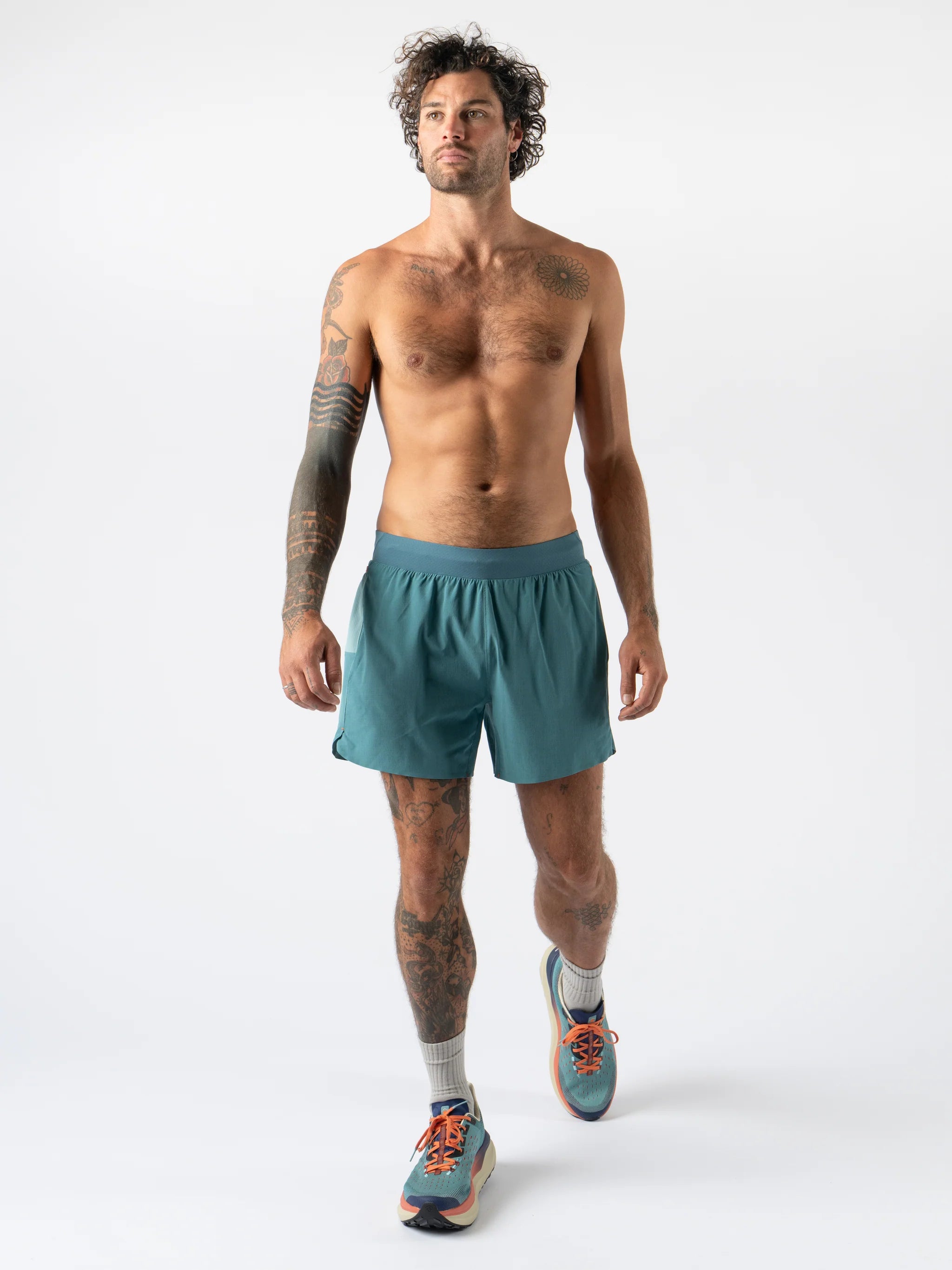FKT 5 - Men by Rabbit in teal with technical stretch fabric, semi-relaxed fit, lightweight durable shorts ideal for trail running