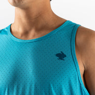 Close-up of man wearing blue Ice Perf Tank - Men by Rabbit with breathable perforations and quick-dry sustainable nylon for running in Canada
