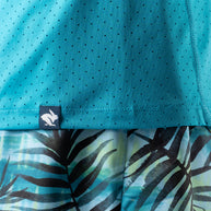 Close-up of turquoise perforated lightweight fabric with Rabbit logo on ICE Perf Tee SS - Men designed for quick-dry comfort and sustainability