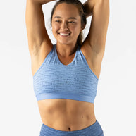 Utili Bra-Vo by Rabbit in light blue, multifunctional sports bra with bounce control and secure laser-cut back pocket for running and workouts