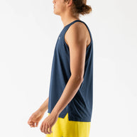 Race Pace Tank - Men by Rabbit in navy blue with breathable laser-cut perfs and microtextured inside, ideal for running and training.