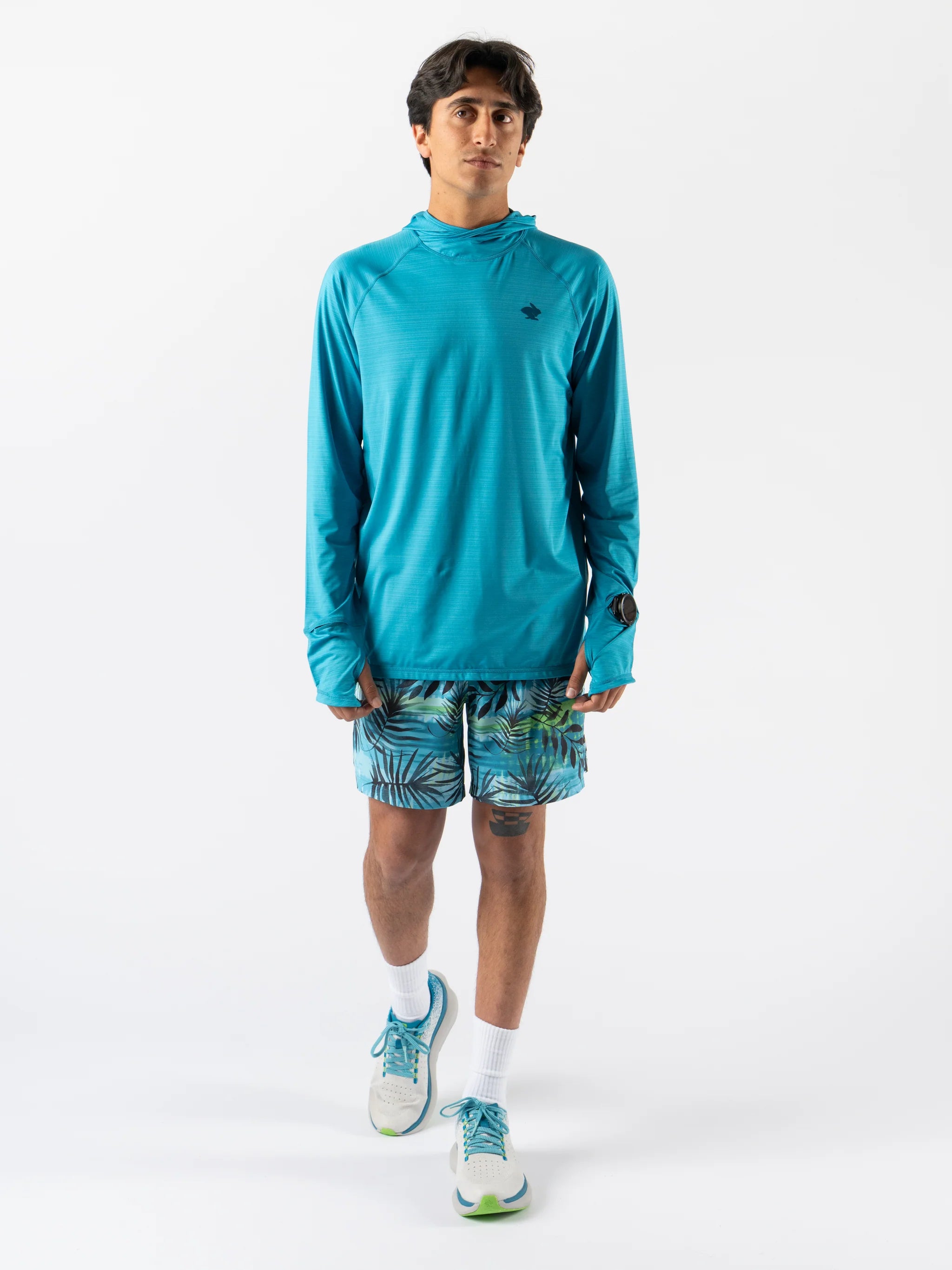 UPF Deflector 2.0 - Men by Rabbit in moonlight blue lightweight jersey top with UPF 50, laser-cut ventilation, and scuba-style hood for sun protection