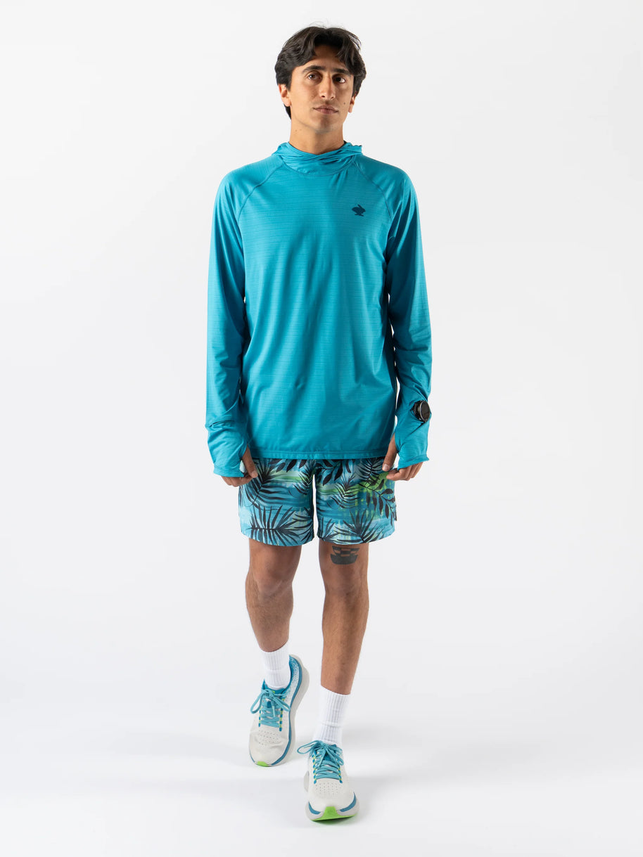 UPF Deflector 2.0 - Men by Rabbit in moonlight blue lightweight jersey top with UPF 50, laser-cut ventilation, and scuba-style hood for sun protection