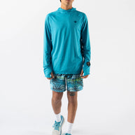 UPF Deflector 2.0 - Men by Rabbit in moonlight blue lightweight jersey top with UPF 50, laser-cut ventilation, and scuba-style hood for sun protection