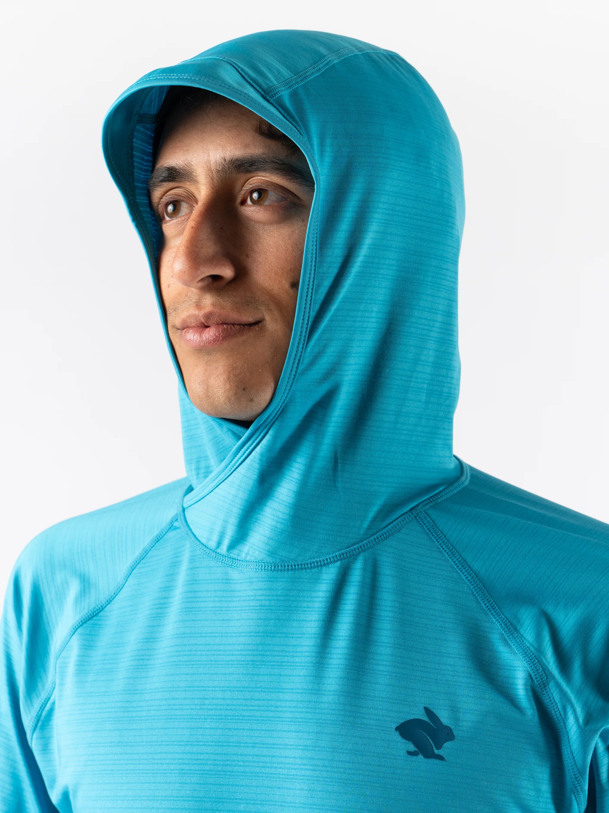 UPF Deflector 2.0 - Men by Rabbit in blue, lightweight jersey with scuba-style hood and laser-cut ventilation for sun protection and running.