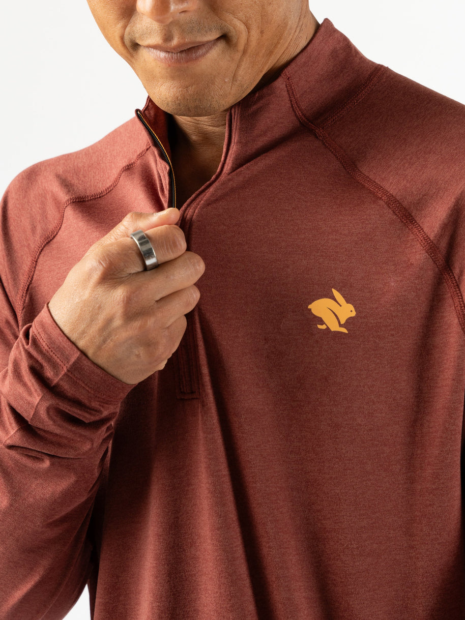 EZ Zip 2.0 - Men by Rabbit in rust red, soft quarter zip shirt with improved neck fit, ideal for running and workouts
