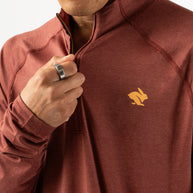 EZ Zip 2.0 - Men by Rabbit in rust red, soft quarter zip shirt with improved neck fit, ideal for running and workouts