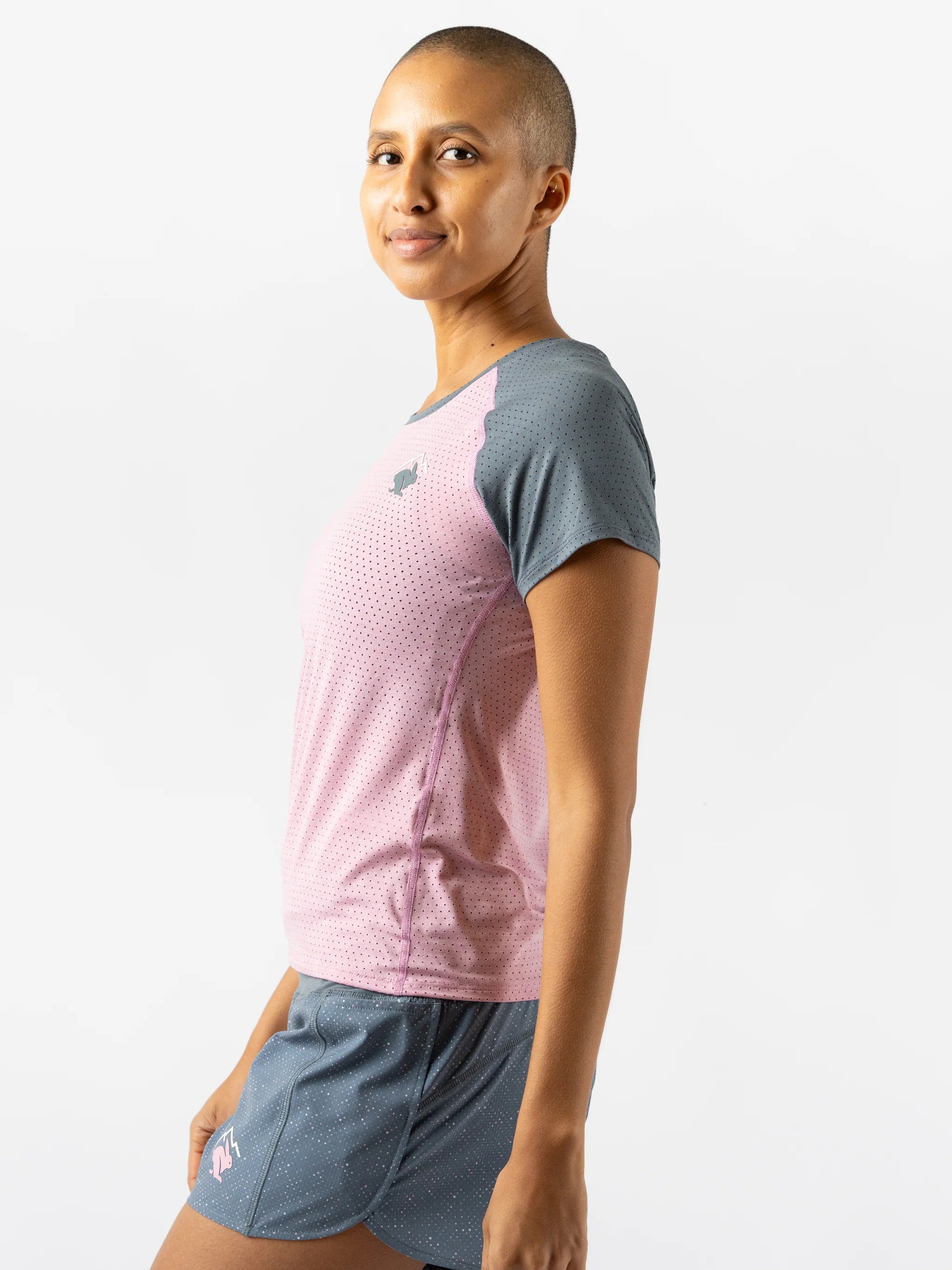 EZ Tee Perf SS Trail - Women by Rabbit in pink and grey, lightweight breathable trail running top with perforations for moisture control