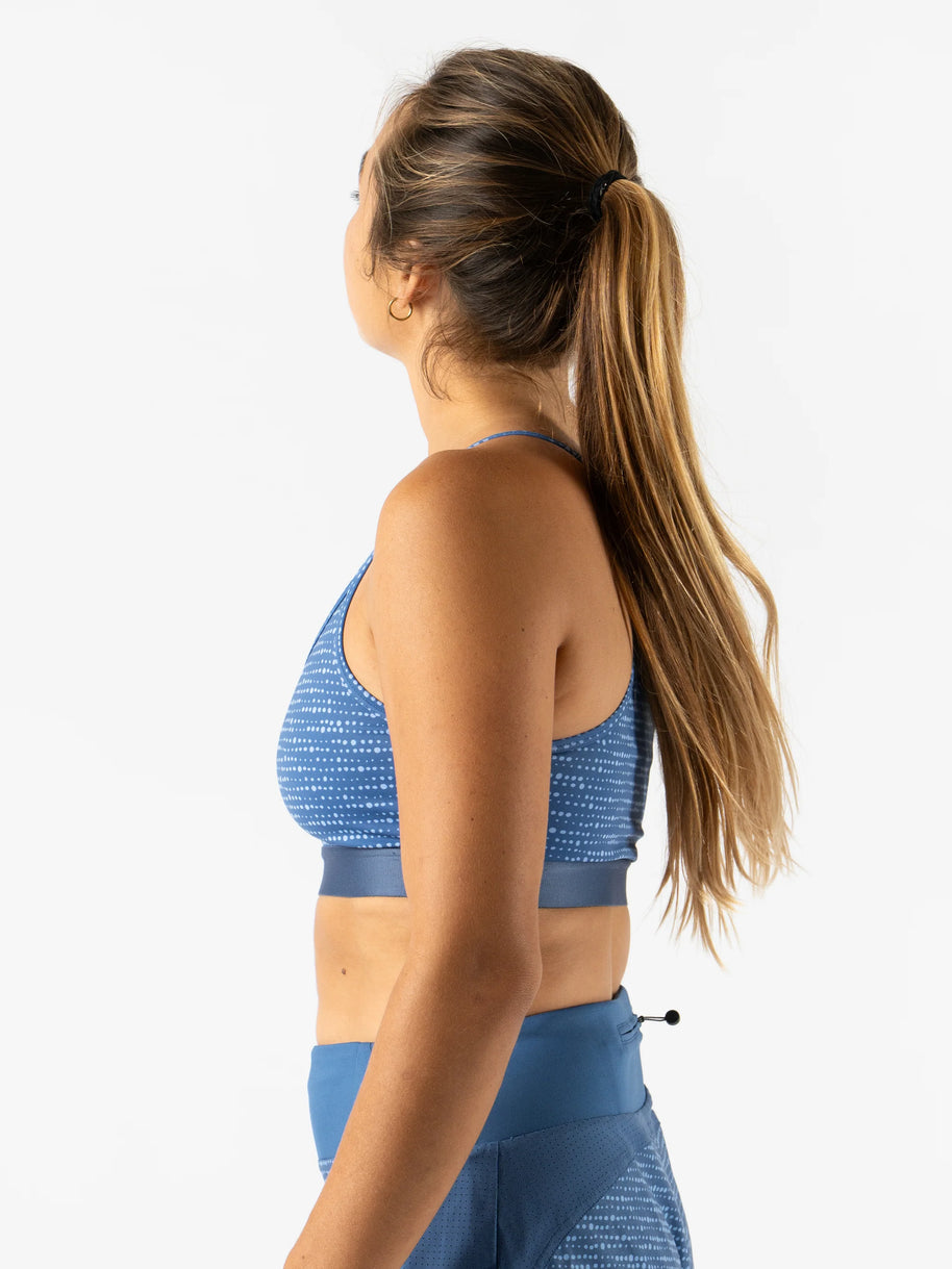 Strappy Pocket Bra - Women by Rabbit in blue with built-in pocket, minimal bounce, and total comfort for secure activewear essentials storage
