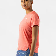 UPF Tee SS - Women by Rabbit in coral with laser-cut perfs, lightweight breathable UPF 50 shirt ideal for running and outdoor use