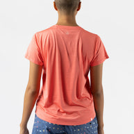 UPF Tee SS - Women by Rabbit in coral lightweight breathable jersey with UPF 50 and laser-cut underarm venting for sun protection