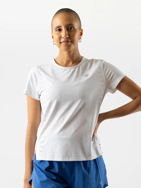 Race Pace Tee SS - Women by Rabbit in white with breathable laser-cut perforations and micro-textured inside for running comfort and performance