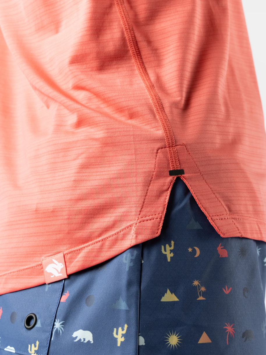 UPF Tee SS - Women by Rabbit in coral with lightweight jersey fabric and laser-cut vented perfs, breathable sun protective top for outdoor use