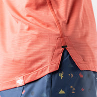UPF Tee SS - Women by Rabbit in coral with lightweight jersey fabric and laser-cut vented perfs, breathable sun protective top for outdoor use