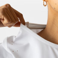 Race Pace Tee SS - Women by Rabbit in white with laser-cut perforations for breathability, semi-relaxed fit, ideal for running and training