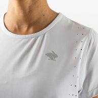 Race Pace Tee SS - Women by Rabbit in white with breathable laser-cut perforations and micro-textured inside for running comfort
