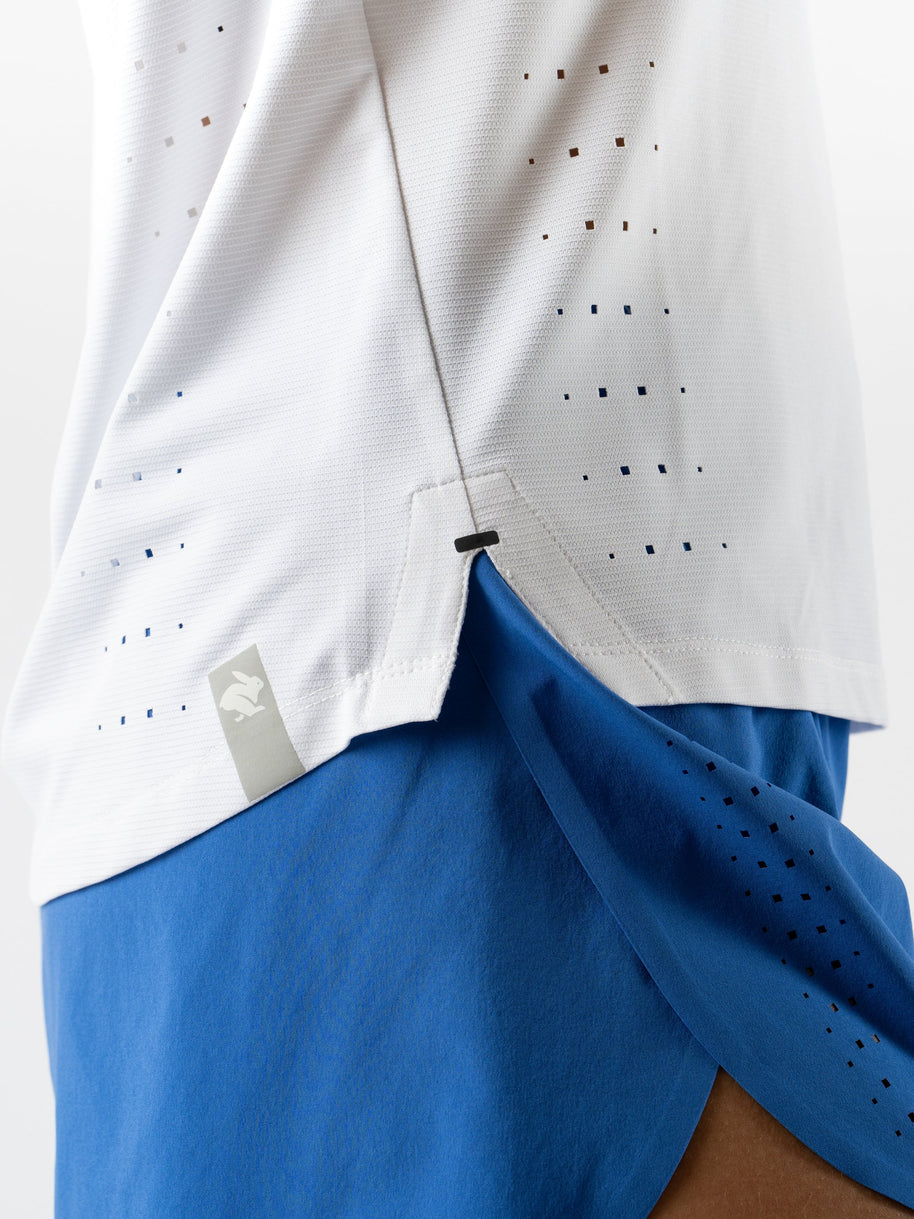 Race Pace Tee SS - Women by Rabbit in white with laser-cut perforations for breathability, lightweight running shirt ideal for training and racing