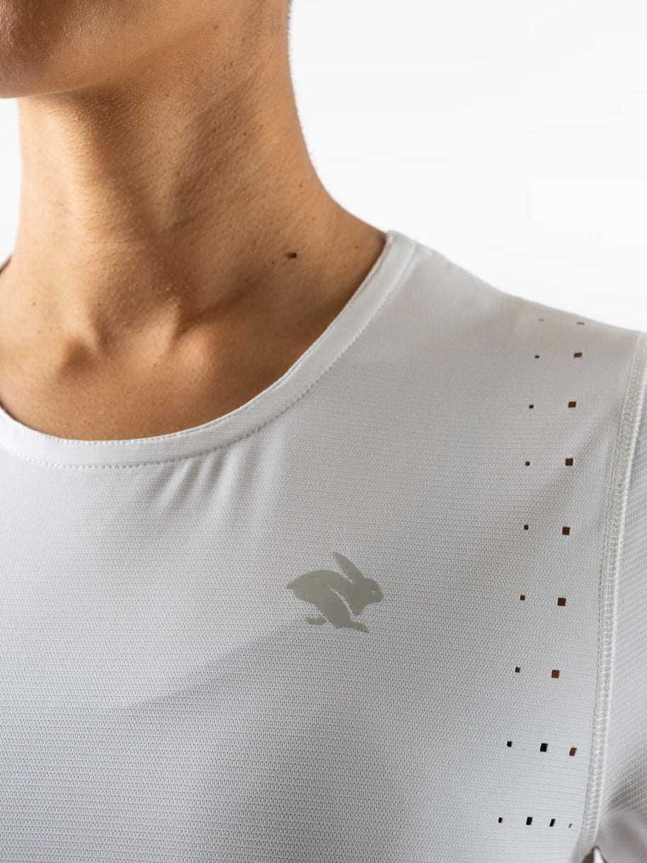 Race Pace Tee SS - Women by Rabbit in white with laser-cut perforations, breathable semi-relaxed running shirt ideal for training and racing