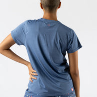 UPF Tee SS - Women by Rabbit in blue, lightweight breathable top with UPF 50 and laser-cut perfs for sun protection and running