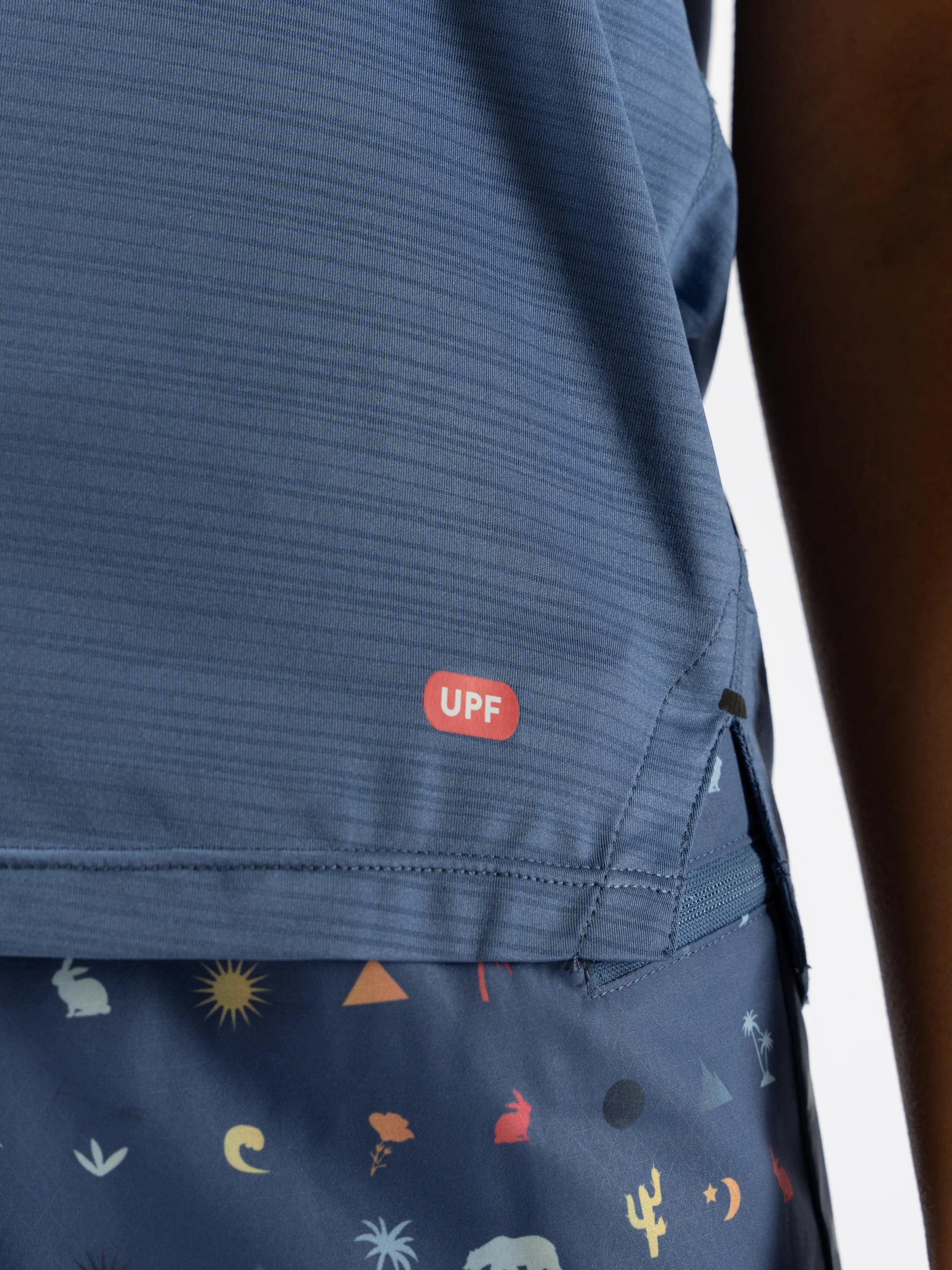 UPF Tee SS - Women by Rabbit in blue with UPF 50 protection, lightweight breathable jersey, laser-cut underarm vents for sun protection and running use