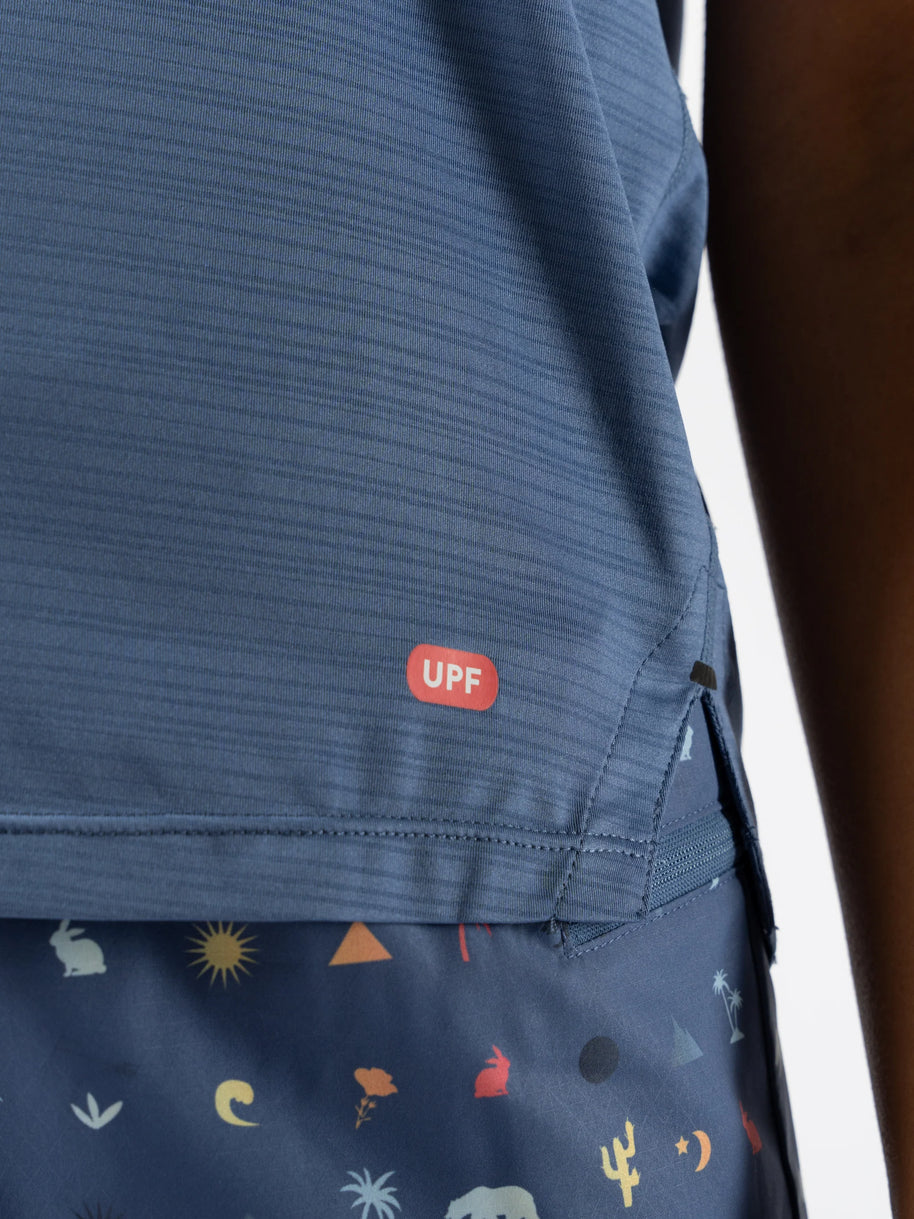 UPF Tee SS - Women by Rabbit in blue with UPF 50 protection, lightweight breathable jersey, laser-cut underarm vents for sun protection and running use