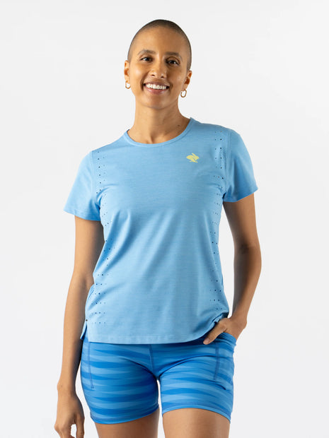 Race Pace Tee SS - Women by Rabbit in light blue with laser-cut perforations, breathable semi-relaxed running shirt for training and racing