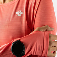 UPF Tee LS - Women by Rabbit in coral, ultralight long sleeve shirt with UPF 50 sun protection and breathable fabric for outdoor running