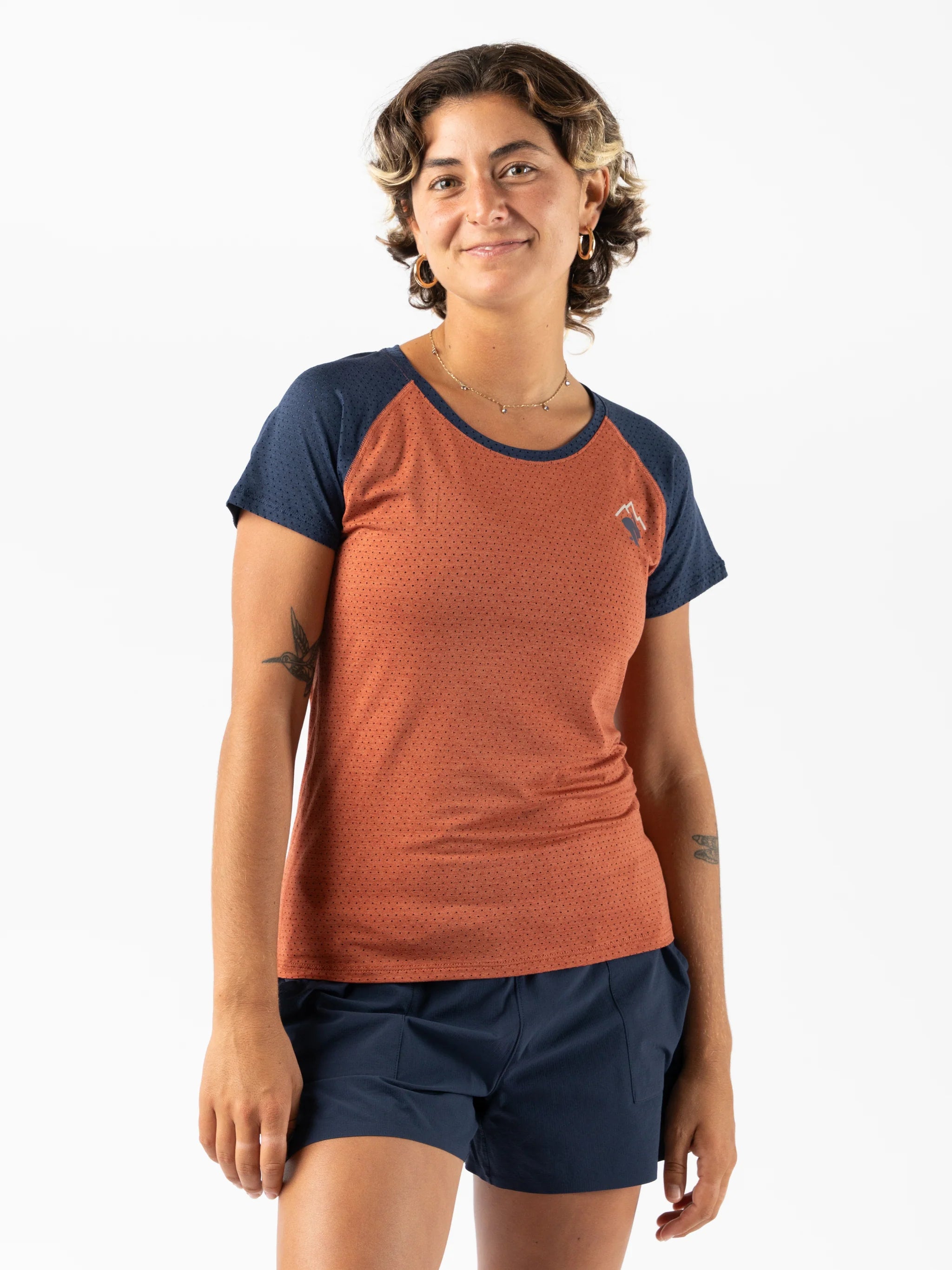 EZ Tee Perf SS Trail - Women by Rabbit in rust and navy, lightweight breathable running top with perforations ideal for trail running and outdoor use
