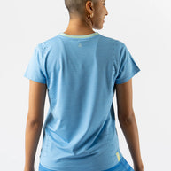 Race Pace Tee SS - Women by Rabbit in light blue with laser-cut perforations, breathable semi-relaxed running shirt for training and race day