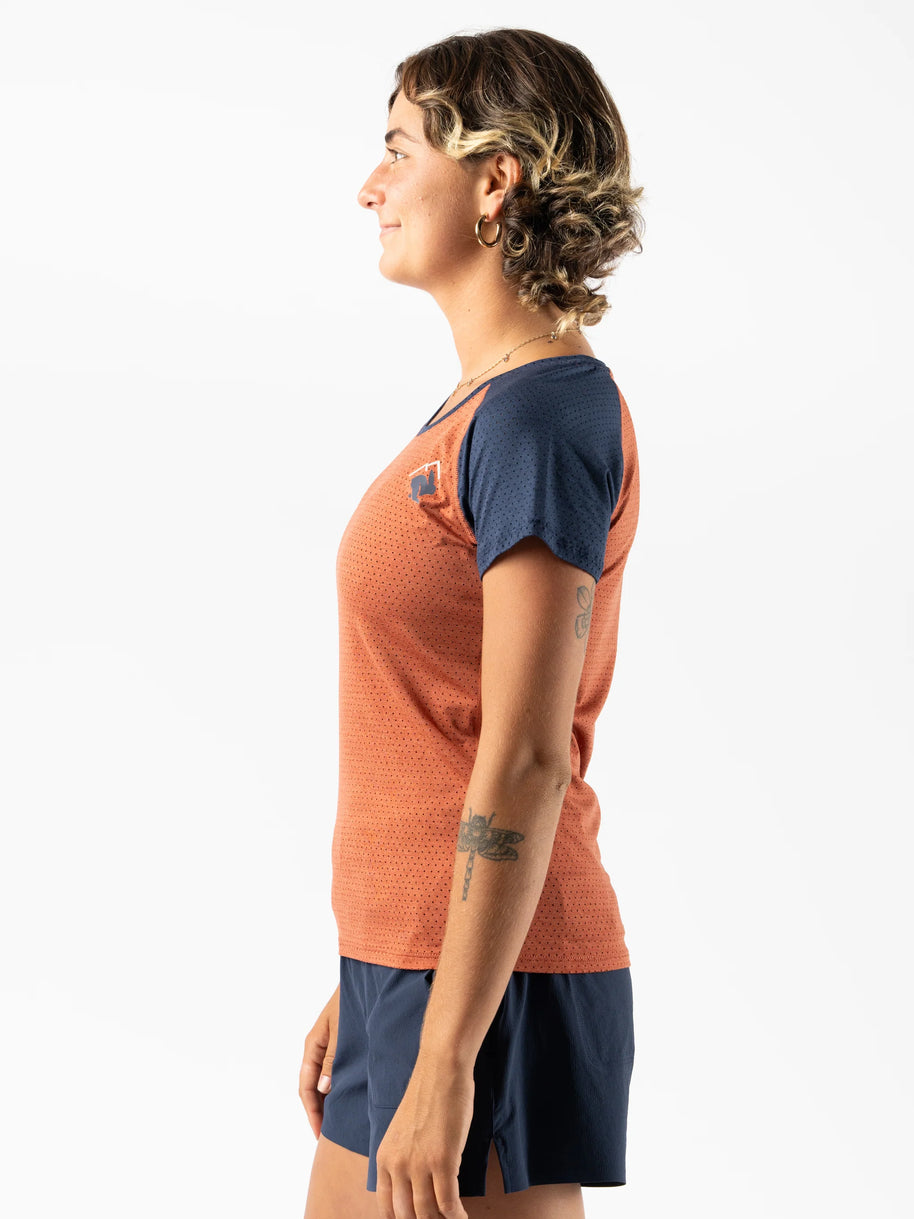 EZ Tee Perf SS Trail - Women by Rabbit in burnt orange and navy, lightweight breathable running top with performance perfs ideal for trail running