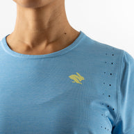 Race Pace Tee SS - Women by Rabbit in light blue with laser-cut perforations, breathable semi-relaxed running shirt for training and races