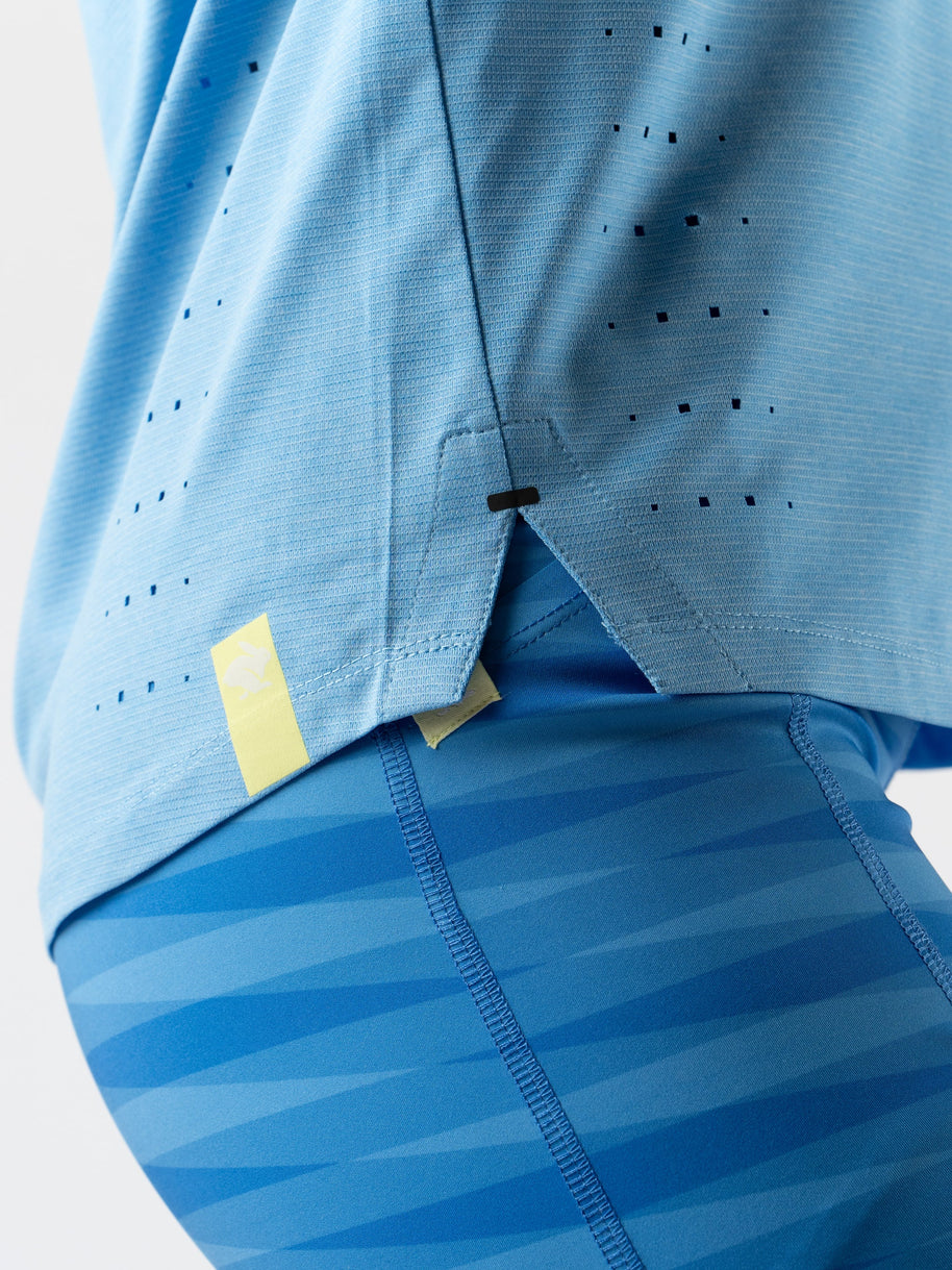 Race Pace Tee SS - Women by Rabbit in light blue with laser-cut perforations for breathability, semi-relaxed fit for running and training